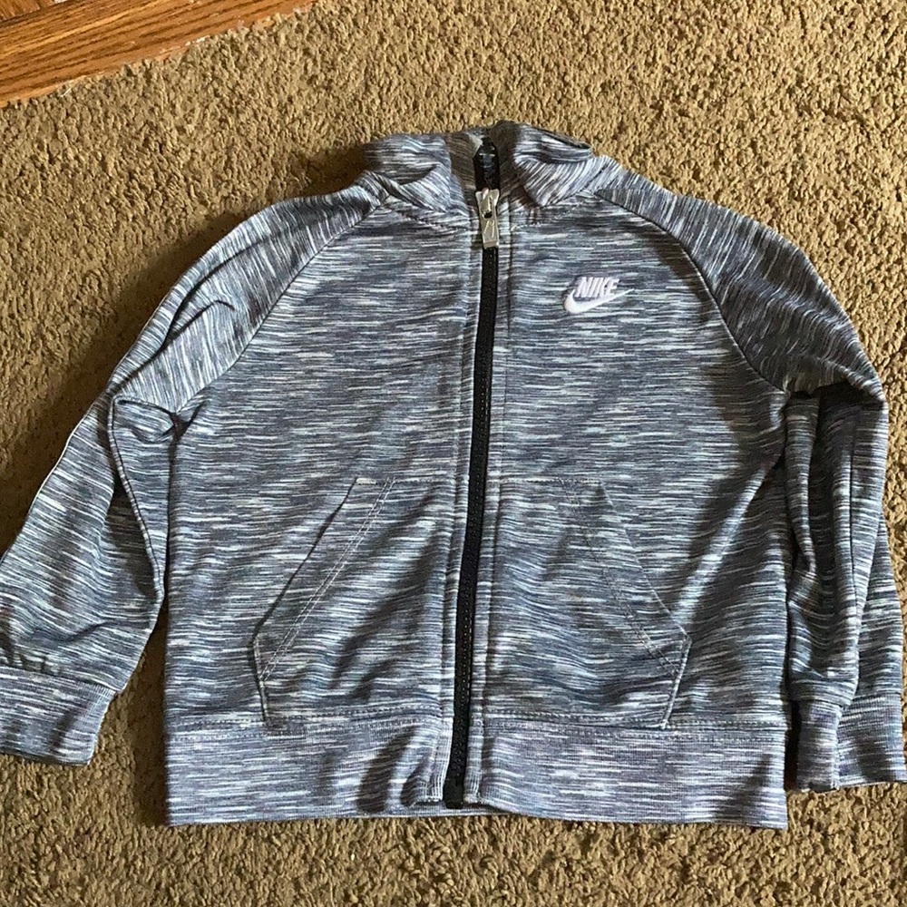 Zip up jacket.